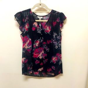 V neck blouse, 100% silk. Ruffled cap sleeves